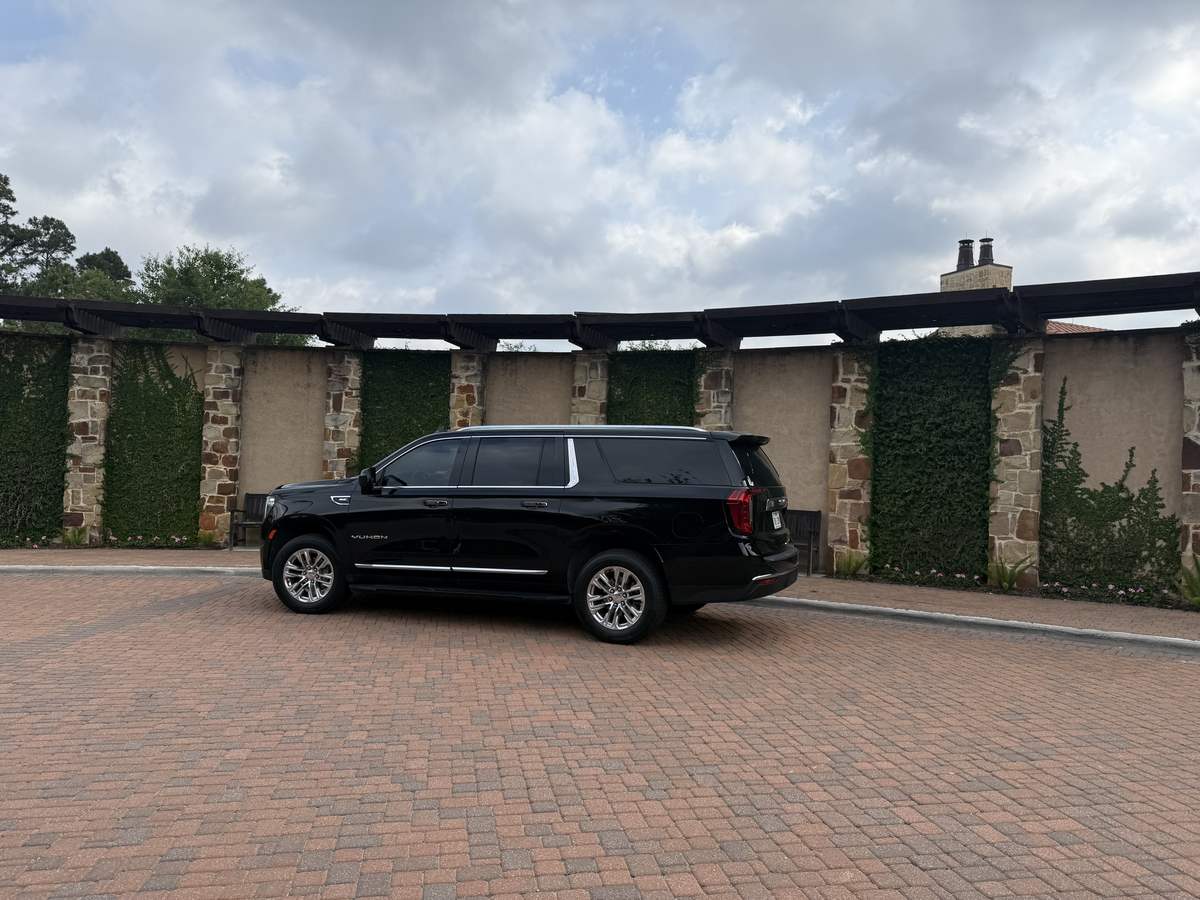 The Woodlands Yukon stone arcade — Houston Limo Chauffeur
